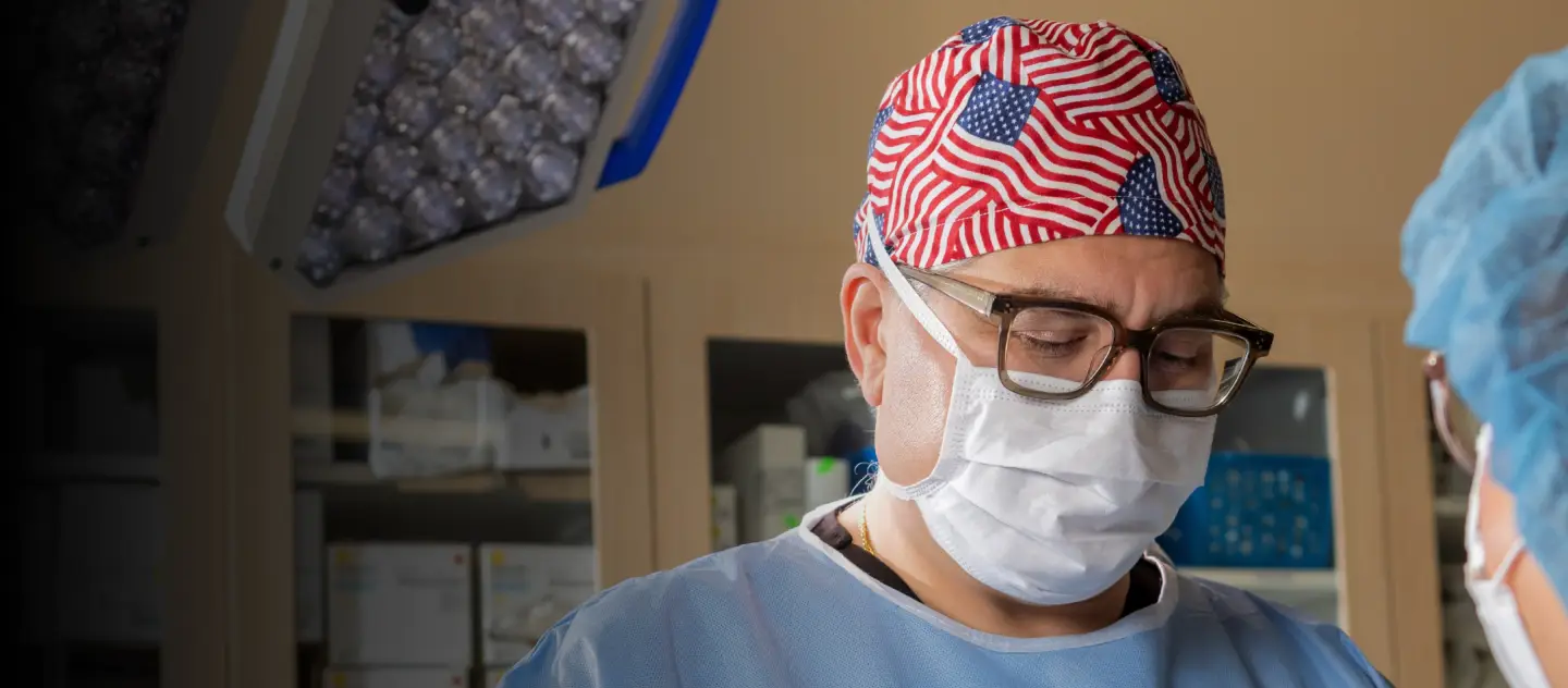 dr sorokin in or flag scrub cap